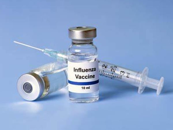 Flu vaccine vile and syringe